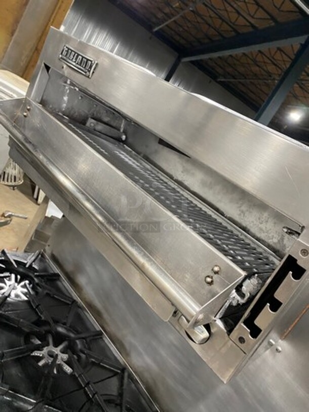 Garland Commercial Gas Powered 8 Burner Stove! With Raised Back Splash And Salamander! With Oven Underneath! All Stainless Steel! On Casters! - Image 7 of 12