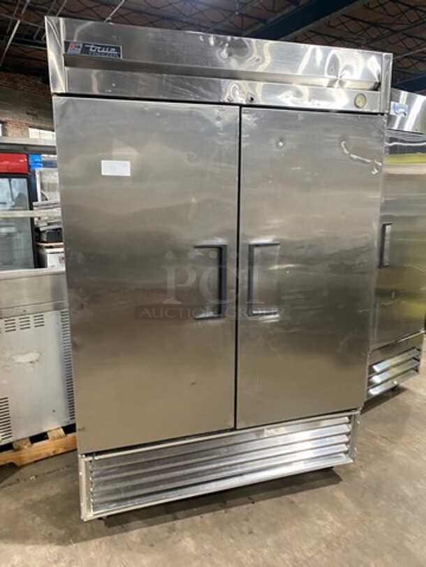 True Commercial 2 Door Reach In Freezer! With Poly Coated Racks! All Stainless Steel! On Casters! Model: T49F SN: 6567161 115V 60HZ 1 Phase