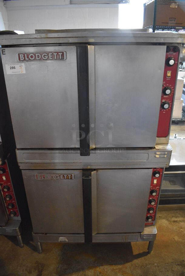2 Blodgett Stainless Steel Commercial Electric Powered Full Size Convection Ovens w/ Solid Doors, Metal Oven Racks and Thermostatic Controls. 208-220 Volts, 3 Phase. 38x39x65. 2 Times Your Bid!