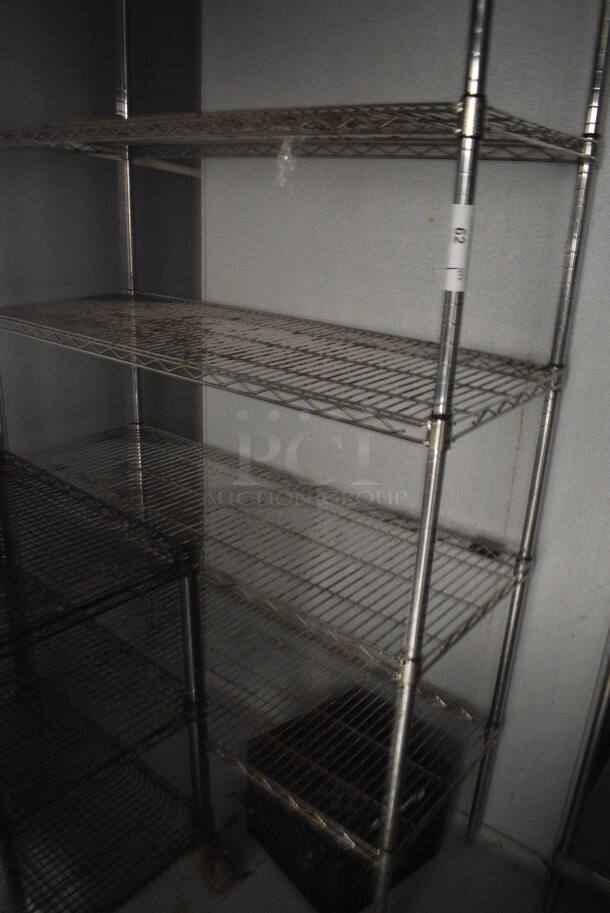 Chrome Finish 4 Tier Wire Shelving Unit. BUYER MUST DISMANTLE. PCI CANNOT DISMANTLE FOR SHIPPING. PLEASE CONSIDER FREIGHT CHARGES.
 48x18x75. (kitchen) - Image 1 of 4