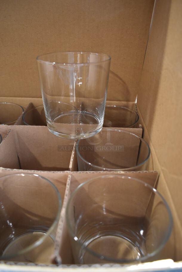 2 Boxes of 12 BRAND NEW Pasabahce Bistro Beverage Glasses. Missing 6 Glasses. 3.5x3.5x3.5. 2 Times Your Bid! - Image 1 of 6
