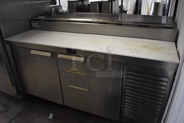 Randell 9110AM Stainless Steel Commercial Pizza Prep Table on Commercial Casters. 115 Volts, 1 Phase. 62x34x42. Tested and Powers On But Does Not Get Cold