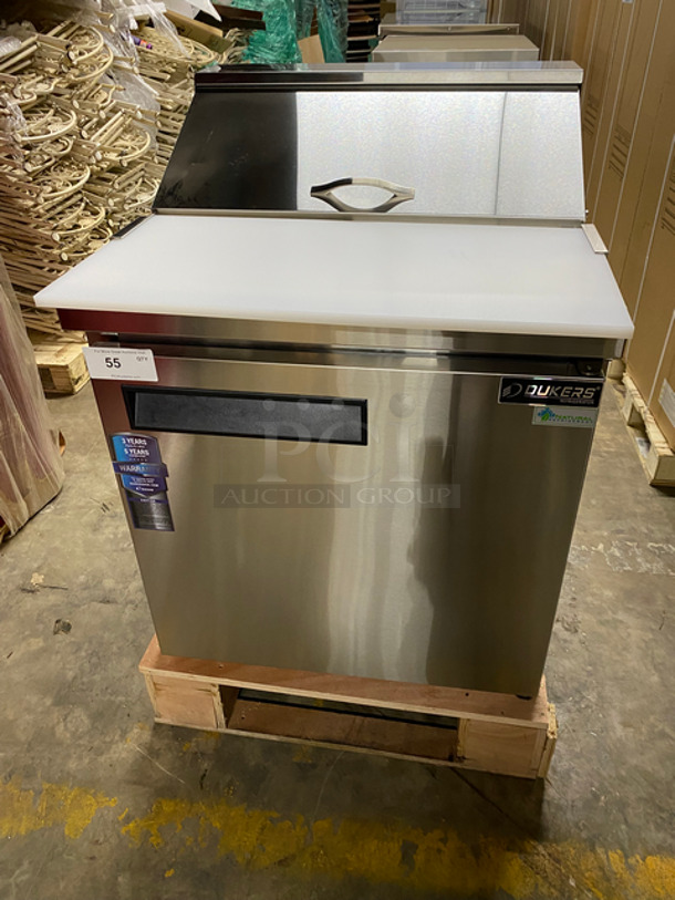 SCRATCH & DENT! Dukers Commercial Refrigerated Sandwich Prep Table! With Commercial Cutting Board! With Single Door Storage Space Underneath! Poly Coated Rack! Solid Stainless Steel! Powers On, Doesn't Go Down To Temp! Model: DSP29 115V 60HZ 1 Phase