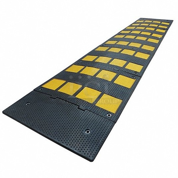 BRAND NEW SCRATCH AND DENT! Grainger 29NH26 Speed Bump, Rubber, Black/Yellow, 9 Ft Lg, 24 Inch Width, 1 1/8 Inch Height, 3x Your Bid. Boxes are damaged.  - Image 1 of 6