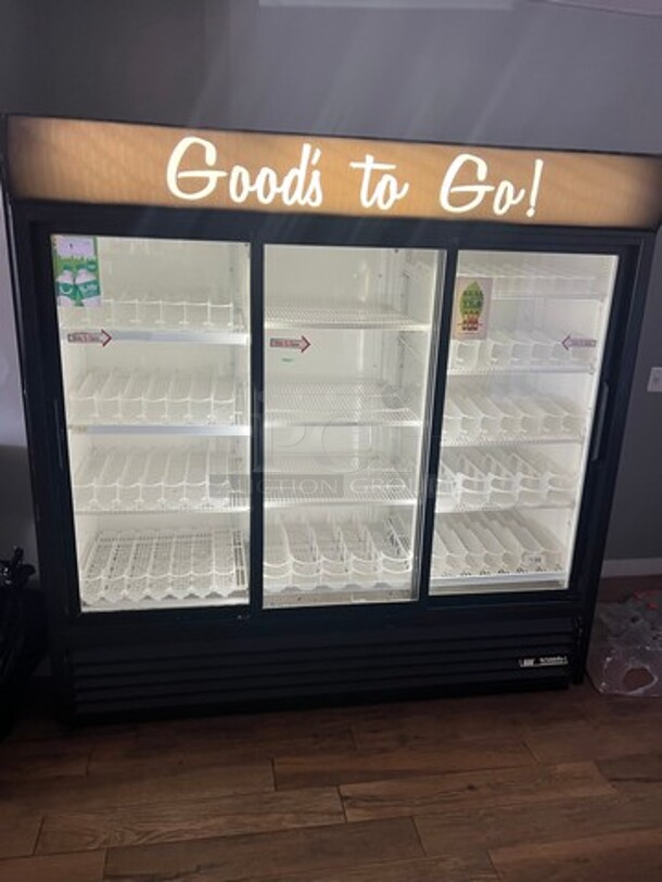 True Commercial 3 Door Reach In Cooler Merchandiser! With View Through Doors! Poly Coated Racks And Drink Racks! WORKING WHEN REMOVED! Model: GDM69 SN: 13482162 115V 60HZ 1 Phase