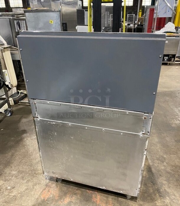 Garland Commercial Natural Gas Powered 4 Burner Stove! With Oven Underneath! With Raised Backsplash! All Stainless Steel! Model M44R  - Image 3 of 9