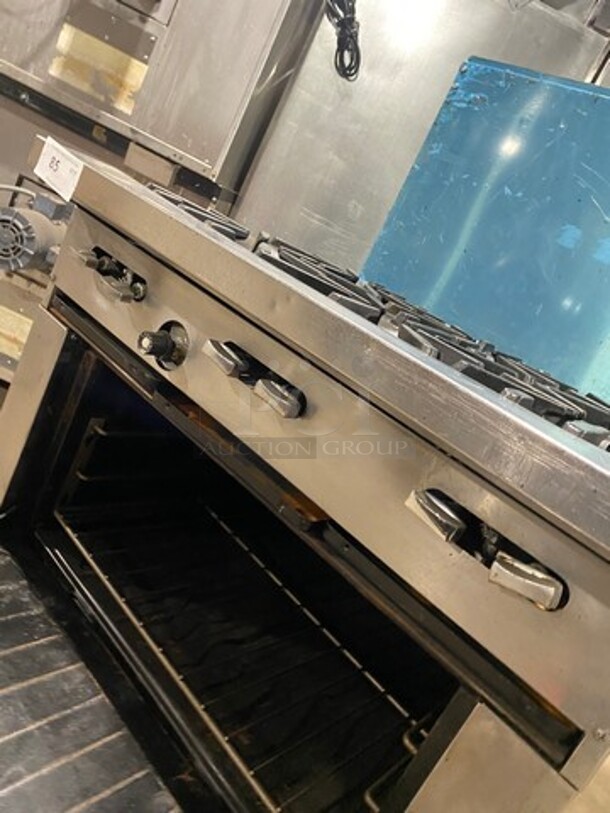 Garland Commercial Natural Gas Powered 6 Burner Stove! With Raised Back Splash! With Oven Underneath! Metal Oven Rack! All Stainless Steel! On Casters! - Image 8 of 9