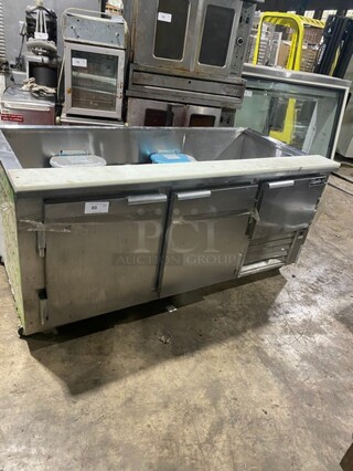Leader Commercial Refrigerated Sandwich/Salad Prep Table! With 2 Door Underneath Storage Space Underneath! With Commercial Cutting Board! All Stainless Steel! Model LB84SC Serial PT031776! 115V 1Phase! On Casters!