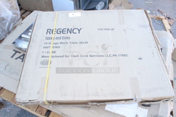 BRAND NEW SCRATCH & DENT! Regency 600T3036G 30" x 36" 18-Gauge 304 Stainless Steel Commercial Work Table with Galvanized Legs and Undershelf. Packaging has minor tears.  - Image 2 of 2