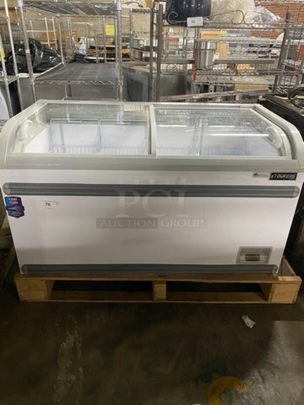 SCRATCH-N-DENT! Dukers Commercial Chest Freezer Showcase Merchandiser! With 2 View Through Sliding Top Doors! With Poly Coated Baskets! Powers On, Doesn't Go Down To Temp! Model: WD500Y SN: 0151000DUK200911201000936 115V 60HZ 1 Phase