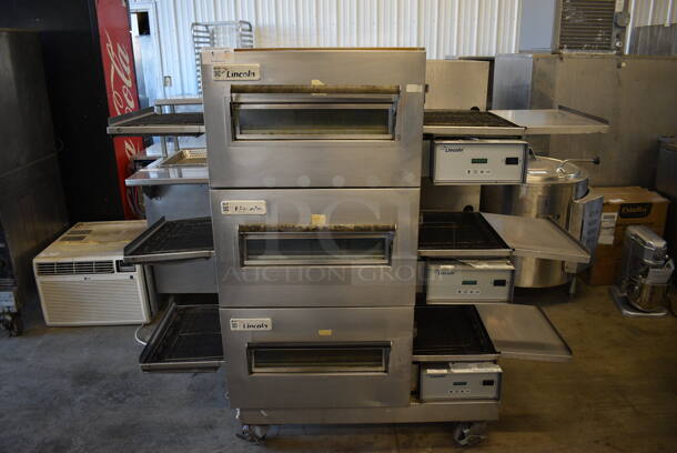 3 Lincoln Impinger Stainless Steel Commercial Electric Powered Conveyor Pizza Oven on Commercial Casters. 120/208 Volts, 3 Phase. 69x39x62. 3 Times Your Bid!