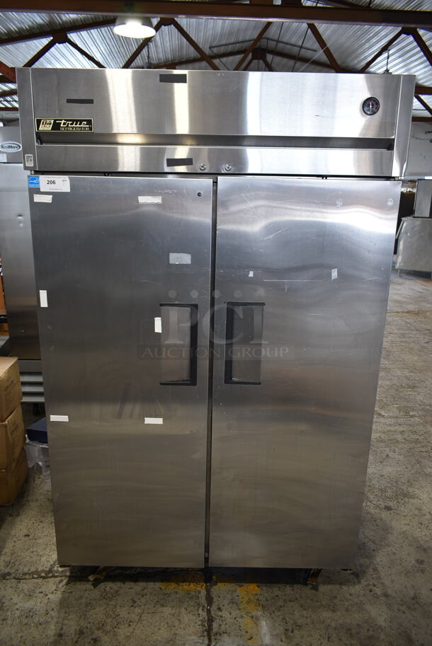 2013 True TG2R-2S ENERGY STAR Stainless Steel Commercial 2 Door Reach In Cooler w/ Poly Coated Racks on Commercial Casters. 115 Volts, 1 Phase. Tested and Working! - Image 1 of 8