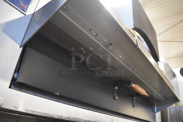 LIKE NEW! Bakers Pride Stainless Steel Commercial Natural Gas Powered Floor Style Il Forno Single Deck Pizza Oven on Metal Legs w/ Commercial Casters. 78x54x68 - Image 12 of 12