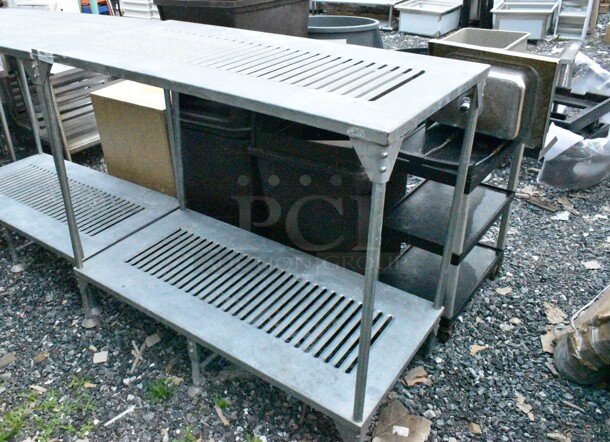 Metal 2 Tier Shelving Unit. BUYER MUST DISMANTLE. PCI CANNOT DISMANTLE FOR SHIPPING. PLEASE CONSIDER FREIGHT CHARGES. - Image 1 of 4
