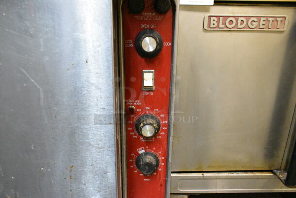 Blodgett Mark V Stainless Steel Commercial Electric Powered Full Size Convection Oven w/ Solid Doors, Metal Oven Racks and Thermostatic Controls on Metal Legs. This Unit Was In Working Condition When the Restaurant Closed. (kitchen) - Image 3 of 9