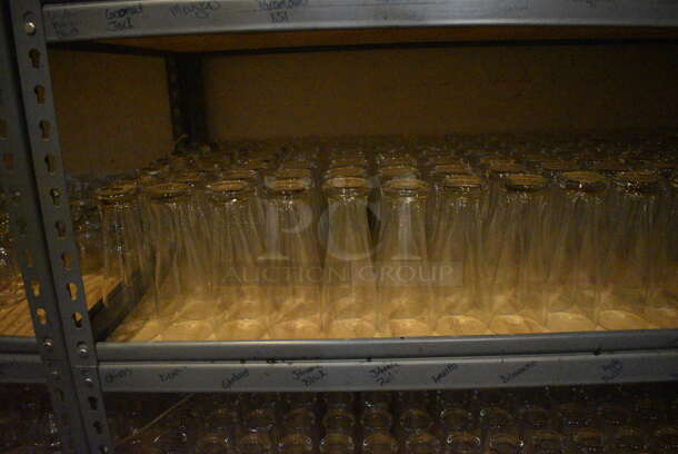 Gray Metal 5 Tier Shelving Unit w/ Contents Including Beverage Glasses and Wine Glasses. 48x24x72. BUYER MUST REMOVE; BUYER MUST DISMANTLE. PCI CANNOT DISMANTLE FOR SHIPPING. PLEASE CONSIDER FREIGHT CHARGES. (glass room - off of bar area) - Image 6 of 10
