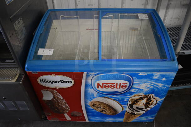 AHT Model RIOS100 Metal Commercial Floor Style Novelty Ice Cream Freezer Merchandiser w/ 2 Sliding Lids on Commercial Casters. 110-120 Volts, 1 Phase. 40x26x28. Tested and Powers On But Does Not Get Cold