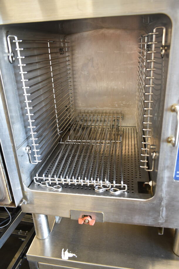 Cleveland 1SCE Stainless Steel Commercial Electric Powered Single Deck Steam Cabinet on ES21301 Stainless Steel Equipment Stand. 208 Volts, 3 Phase.  - Image 3 of 7