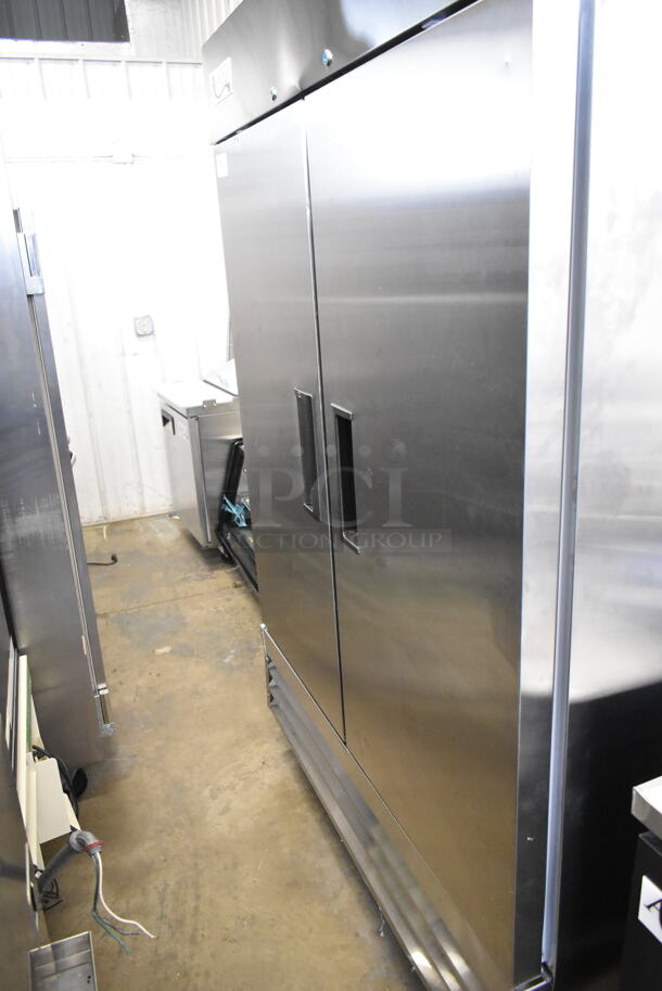 BRAND NEW SCRATCH AND DENT! 2023 Avantco 178A49RHC Stainless Steel Commercial 54" 2 Door Reach In Cooler w/ Poly Coated Racks. 115 Volts, 1 Phase. Tested and Working! - Image 2 of 7