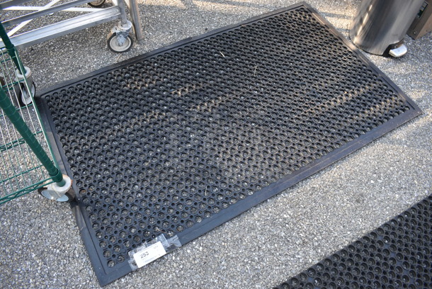 Black Anti Fatigue Floor Mat. See Pictures For Rip. 60.5x38x1