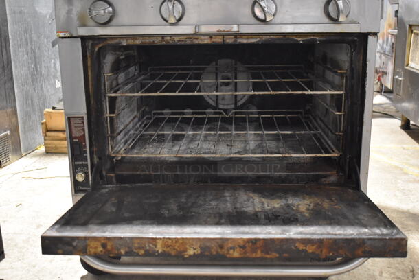 Southbend Stainless Steel Commercial Natural Gas Powered 4 Burner Range w/ Convection Oven and Back Splash on Commercial Casters. - Image 4 of 5