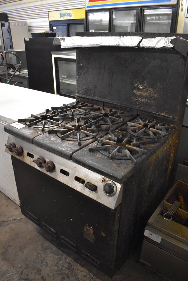 Wolf Metal Commercial Natural Gas Powered 6 Burner Range w/ Oven, Over Shelf and Back Splash. 34x36x58 - Image 2 of 9