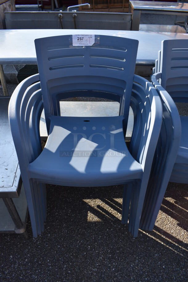 5 Blue Poly Patio Chairs w/ Arm Rests. 23.5x17x33. 5 Times Your Bid!