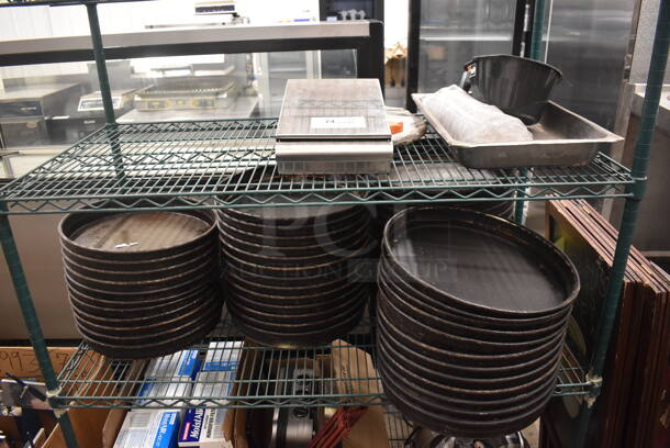 ALL ONE MONEY! Lot of Cast Iron/Metal Circular Trays, Brew Basket. Electrical Plug, Aluminum Pan AND MORE! Does Not Include Metro Shelf. - Image 1 of 3