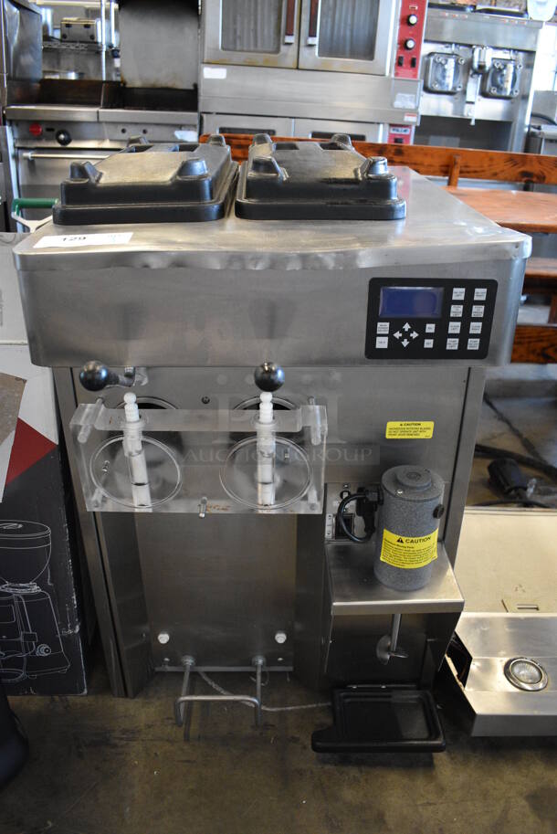 2019 Stoelting SF121-38I2 Stainless Steel Commercial Countertop Air Cooled 2 Flavor w/ Twist Soft Serve Ice Cream Machine. Serial 6408503P. 208-240 Volts, 1 Phase. 22x32x34