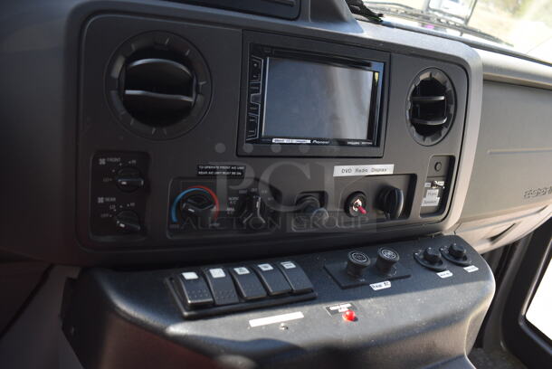 2011 Ford Ecoline Passenger Bus. Odometer Reads 29,039. VIN 1FDFE4FS5BDB14627. Title In Hand. The bus is a 14-passenger, with a space for a wheelchair to fasten to the floor. Vehicle Runs and Drives But Battery Needs To Be Reconnected. See Lot #12 For Additional Pictures - Image 12 of 12