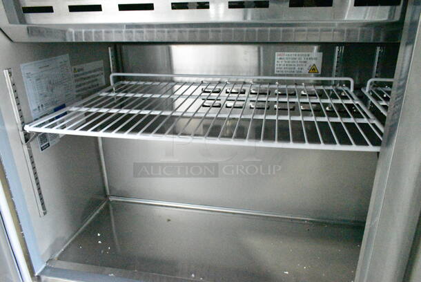 BRAND NEW SCRATCH AND DENT! 2024 Avantco 178SSPT60MHC Stainless Steel  60" 2 Door Mega Top Stainless Steel Refrigerated Sandwich Prep Table on Commercial Casters. 115 Volts, 1 Phase. Tested and Working! - Image 8 of 10