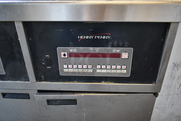 2015 Henny Penny OFG-342 Stainless Steel Commercial Floor Style Natural Gas Powered 2 Bay Deep Fat Fryer w/ Filtration System on Commercial Casters. 240,000 BTU.  - Image 8 of 11