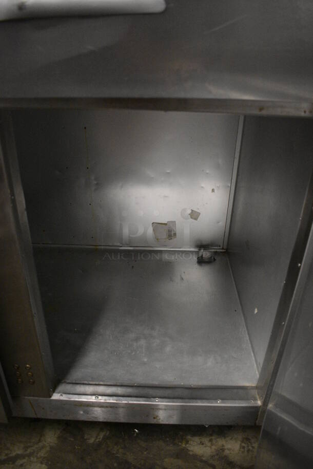 Traulsen Model G20000MC Stainless Steel Commercial 4 Half Size Door Reach In Cooler w/ Poly Coated Racks on Commercial Casters. 115 Volts, 1 Phase. 52x35x84. Tested and Working! - Image 5 of 10