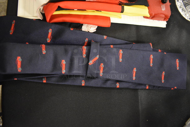 ALL ONE MONEY! Lot of Various Ferrari Items Including Keychains, Flag, Tie, and Accessory Book - Image 5 of 9