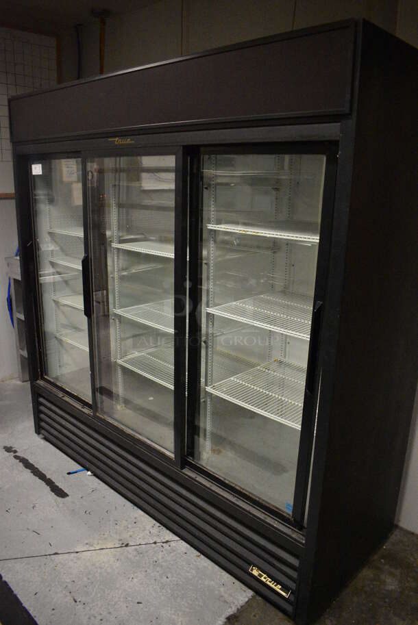 2014 True GDM-69-LD ENERGY STAR Metal Commercial 3 Door Reach In Cooler Merchandiser w/ Poly Coated Racks. 115 Volts, 1 Phase. 78.5x30x78.5. Item Was in Working Condition on Last Day of Business. (kitchen)