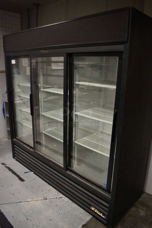 2014 True GDM-69-LD ENERGY STAR Metal Commercial 3 Door Reach In Cooler Merchandiser w/ Poly Coated Racks. 115 Volts, 1 Phase. 78.5x30x78.5. Item Was in Working Condition on Last Day of Business. (kitchen) - Image 1 of 7