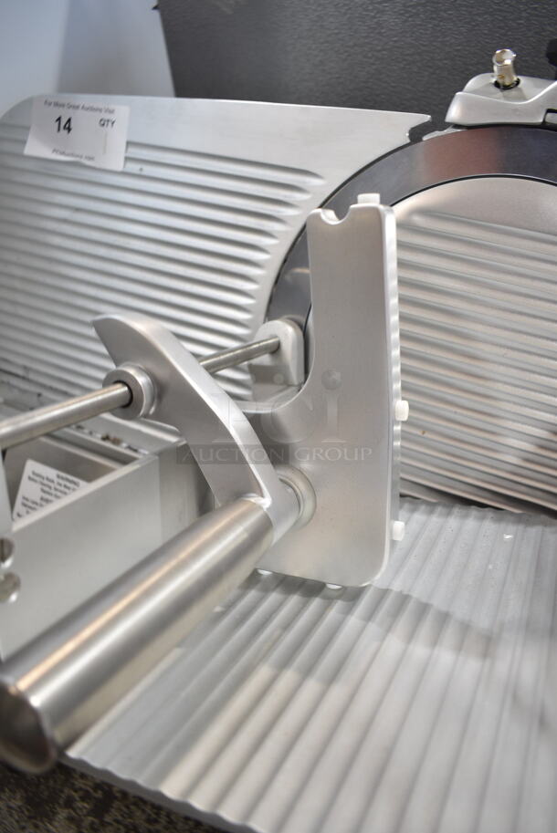 BRAND NEW SCRATCH AND DENT! Estella 348SLA13 Stainless Steel Commercial Countertop Automatic Meat Slicer w/ Blade Sharpener. 120 Volts, 1 Phase. Tested and Powers On But Parts Do Not Move
 - Image 6 of 8