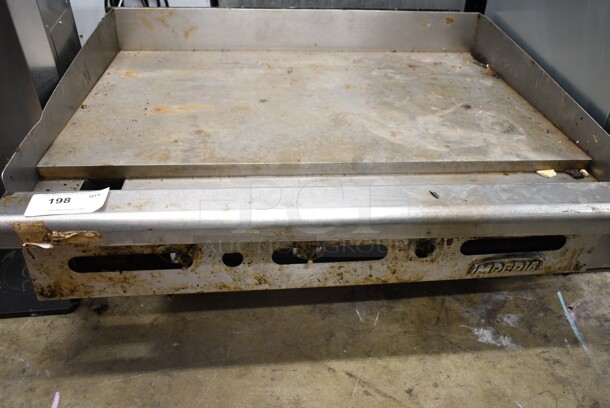 Imperial Stainless Steel Commercial Countertop Natural Gas Powered Flat Top Griddle.  - Image 1 of 5