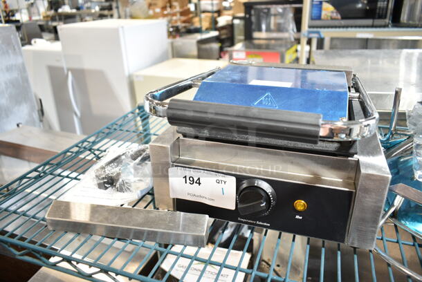 BRAND NEW SCRATCH AND DENT! 2023 Galaxy 177P65SG Stainless Steel Commercial Countertop Single Panini Sandwich Grill with Grooved Top and Smooth Bottom Plates - 8 1/2" x 8 1/2" Cooking Surface. 120 Volts, 1 Phase. Tested and Working! - Image 2 of 6
