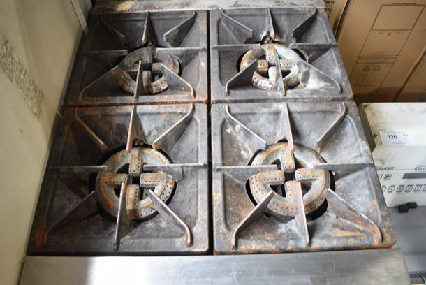 Cooking Performance Group CPG 351S24N Stainless Steel Commercial Natural Gas Powered 4 Burner Range w/ Oven and Back Splash on Commercial Casters. 150,000 BTU.  - Image 3 of 6