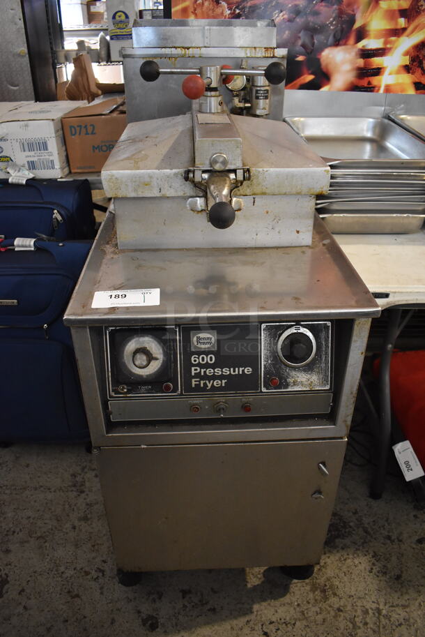 Henny Penny 600 Stainless Steel Commercial Floor Style Natural Gas Pressure Fryer on Commercial Casters. 80,000 BTU. 18x40x48