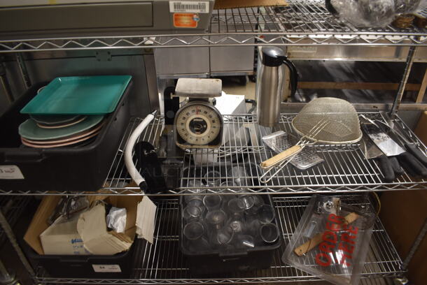 ALL ONE MONEY! Lot of Pink And Blue Dishes, Kitchen Knives With Black Handles, Strainer, Portion Control Scale, AND MORE! Does Not Include Metro Shelf - Image 1 of 3