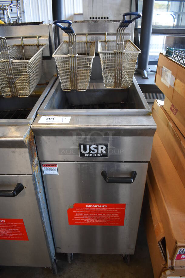 2019 USR Cookline CF-40 Stainless Steel Commercial Floor Style Natural Gas Powered Deep Fat Fryer w/ 2 Metal Fry Baskets on Commercial Casters. 90,000 BTU. 16x30x45