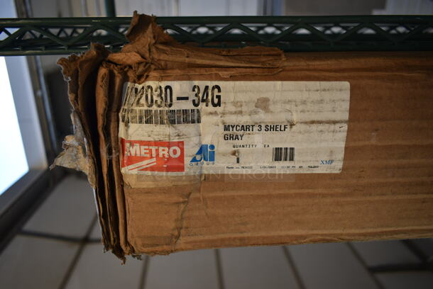 BRAND NEW IN BOX! Metro myCart MY2030-34G Gray Utility Cart with Three Shelves and Chrome Posts - 24" x 34". Stock Picture Used as Gallery. - Image 4 of 4