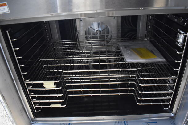 BRAND NEW SCRATCH AND DENT! Vulcan VC4ED ENERGY STAR Stainless Steel Commercial Electric Powered Full Size Convection Oven w/ View Through Doors, Metal Oven Racks and Thermostatic Controls. 208 Volts, 3/1 Phase. - Image 4 of 5