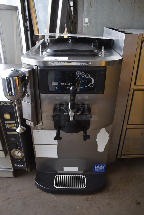 Taylor Model C709-33 Stainless Steel Commercial Countertop Air Cooled Single Flavor Soft Serve Ice Cream Machine. Comes w/ Extra Panel. 208-230 Volts, 3 Phase. 22x30x35.5