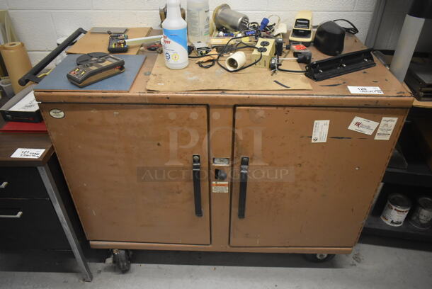Tan Metal 2 Door Cabinet w/ Contents Including Panasonic Commercial Electric Stapler and Tools on Commercial Casters. - Image 1 of 12