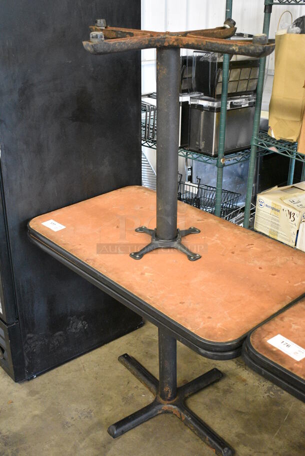 2 Brown Dining Tables on Black Metal Table Base. 42.5x24.5x30.5. 2 Times Your Bid!