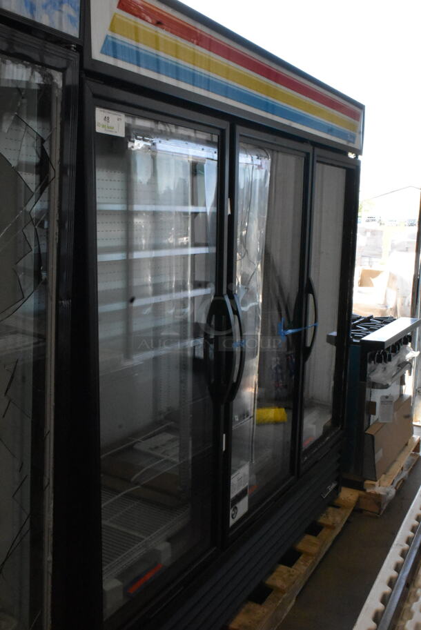BRAND NEW SCRATCH AND DENT! 2023 True GDM-72-HC Metal Commercial 3 Door Reach In Cooler Merchandiser w/ Poly Coated Racks. Right Door Missing Glass. 115 Volts, 1 Phase. Tested and Working!