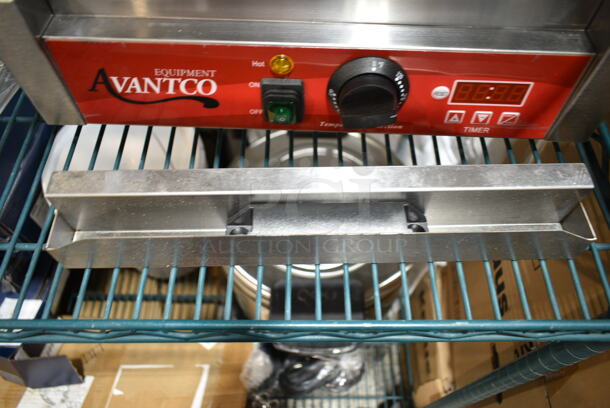 BRAND NEW SCRATCH AND DENT! 2023 Avantco 177PG200GST Stainless Steel Commercial Panini Sandwich Grill with Timer, Grooved Top and Smooth Bottom Plates, and 13 3/8" x 8 3/4" Cooking Surface. 120 Volts, 1 Phase. Tested and Working! - Image 3 of 5